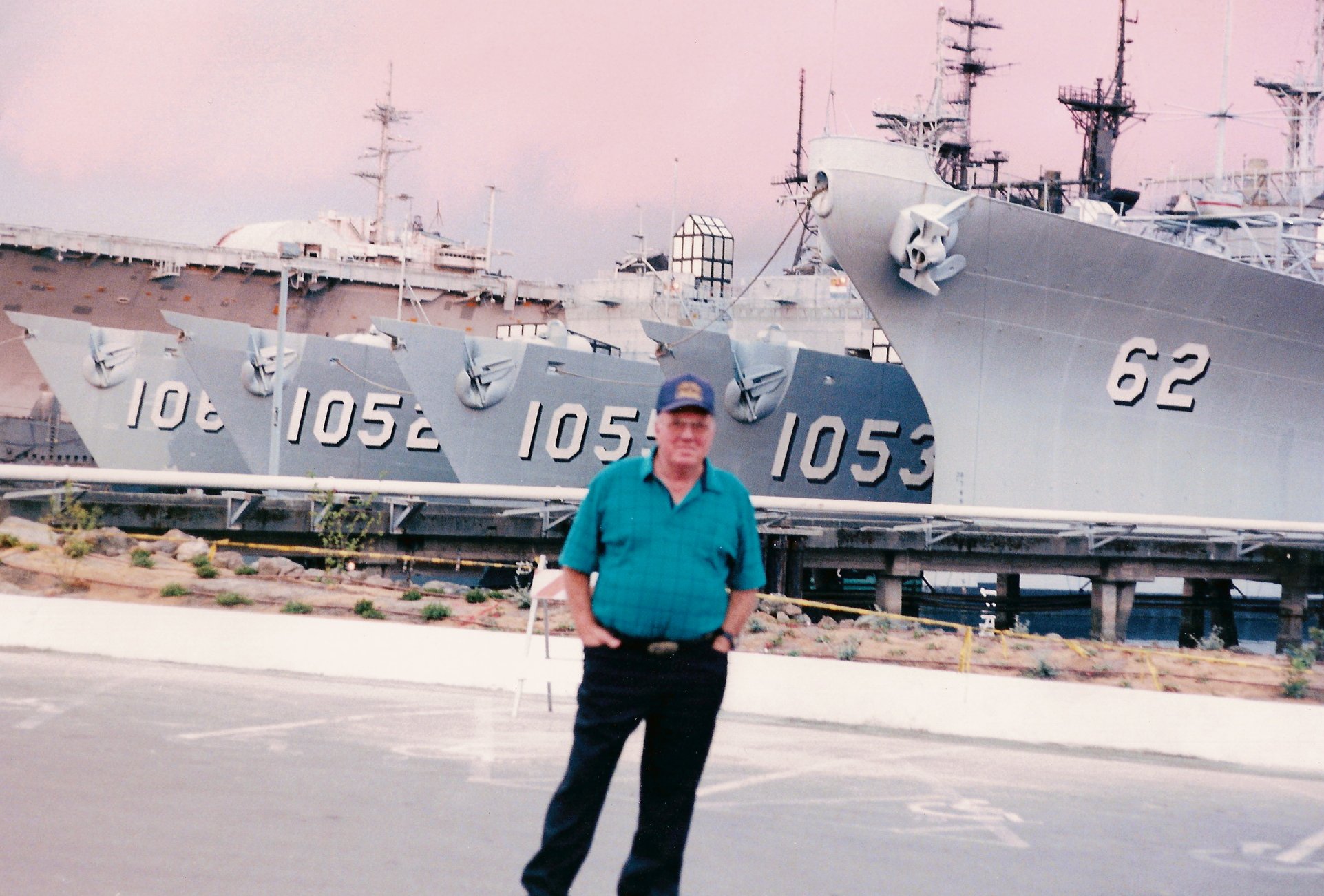 James in front of a Navy Destroyer